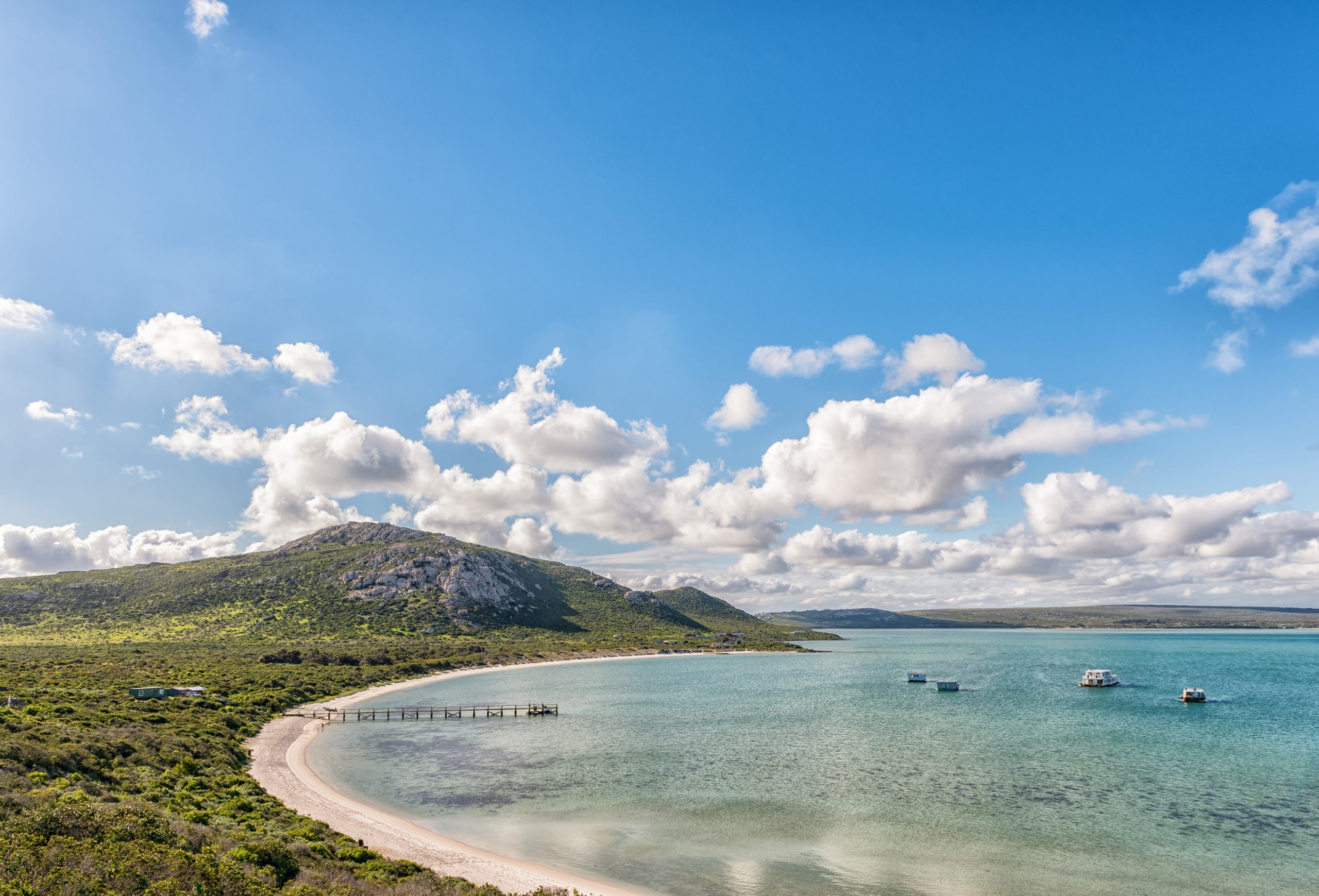 West Coast National Park, South Africa, August 20, 2018: A view of Kraalbaai at the Langebaan Lagoon on the Atlantic Ocean coast in the Western Cape Province. A jetty and houseboats are visible